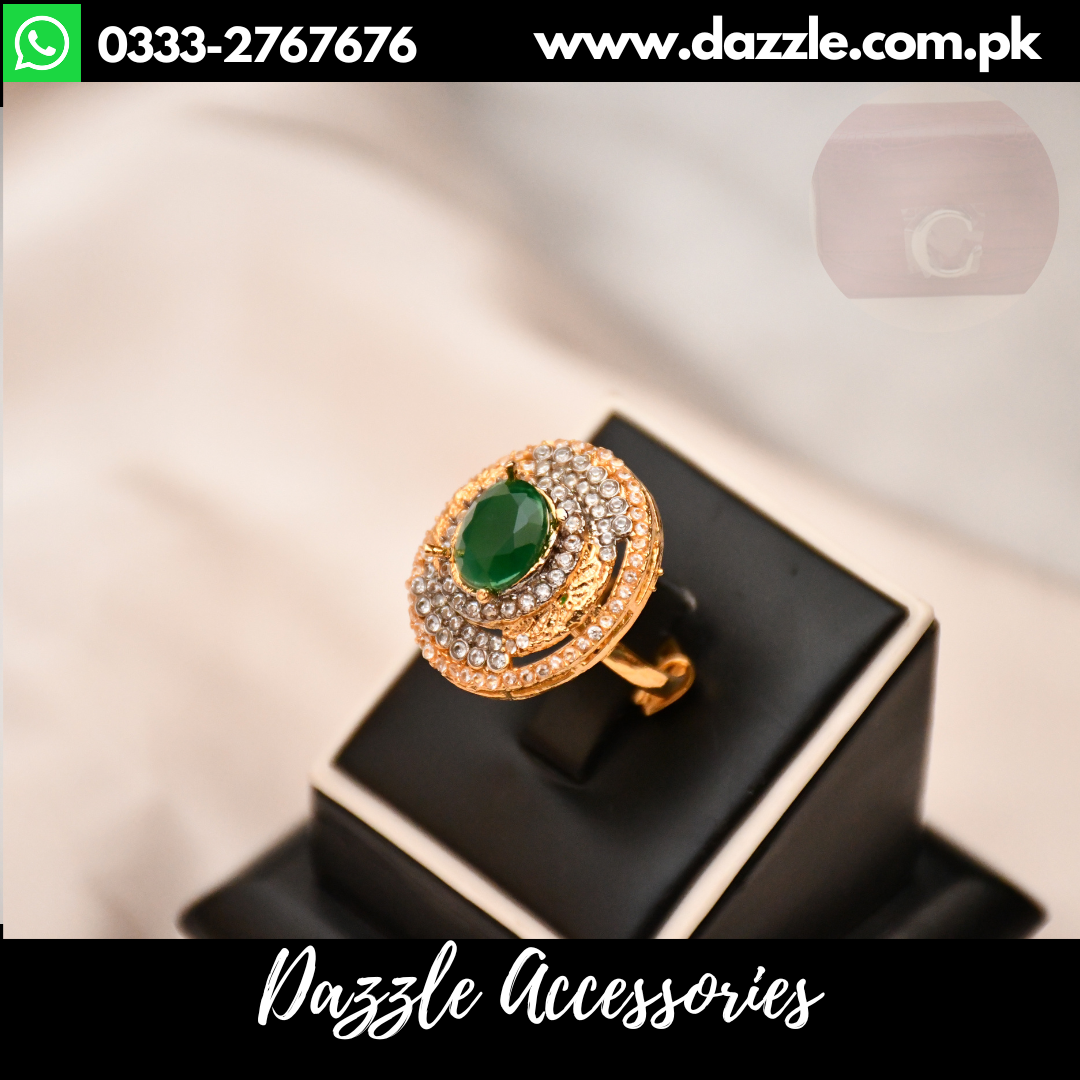 Gold ring store in green stone